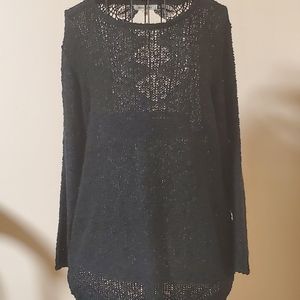 Miracle black sweater with 4 openings in back size M/L